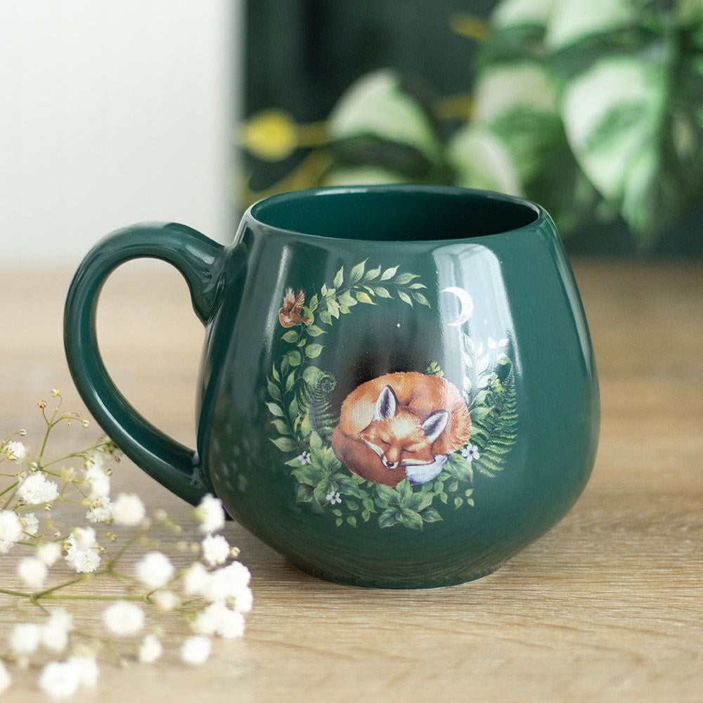 Fox Sleeping Mug : Green mug with fox asleep in foliage design